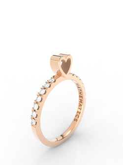 Top view of 14k yellow gold diamond pavé heart slice ring, featuring length and look of slice ring design, white diamonds