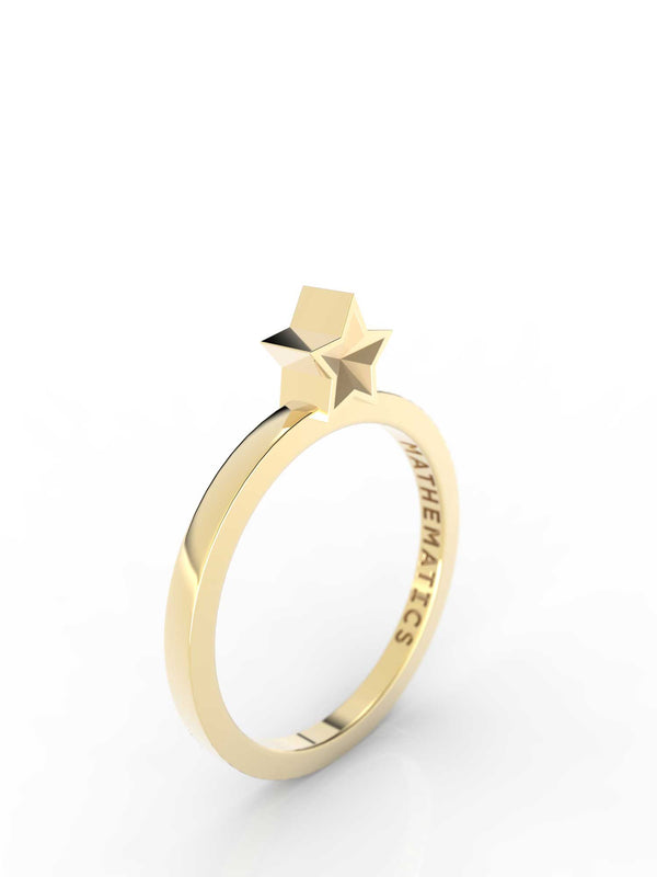 Isometric view of 14k yellow gold star slice ring, featuring architectural slice design