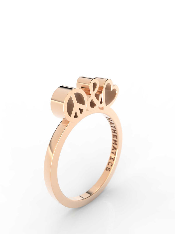 Top view of 14k yellow gold peace and love slice ring, featuring length and look of slice ring design