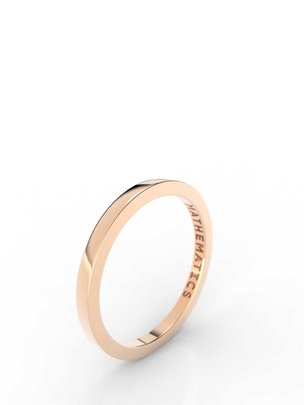 Top view of 14k yellow gold stacking band, featuring length and look of slice ring design