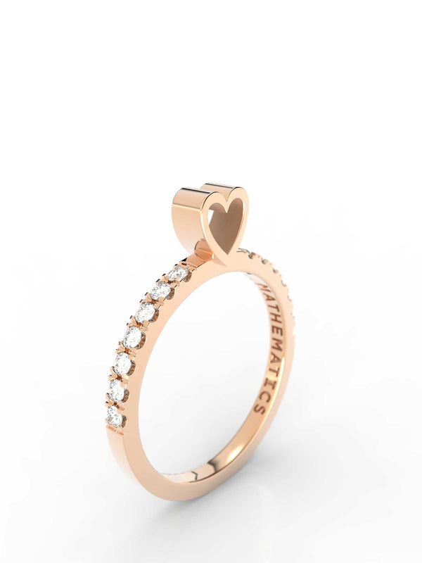 Top view of 14k yellow gold diamond pavé heart slice ring, featuring length and look of slice ring design, white diamonds