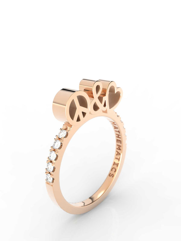 Top view of 14k yellow gold diamond pavé peace and love slice ring, featuring length and look of slice ring design, white diamonds