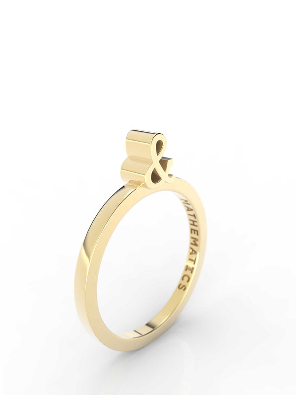 Isometric view of 14k yellow gold ampersand slice ring, featuring architectural slice design