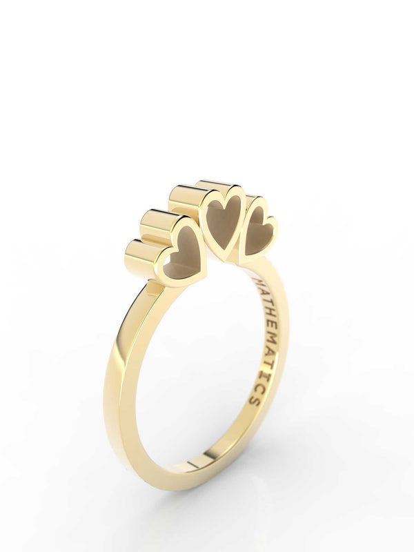 Isometric view of 14k yellow gold triple heart slice ring, featuring architectural slice design